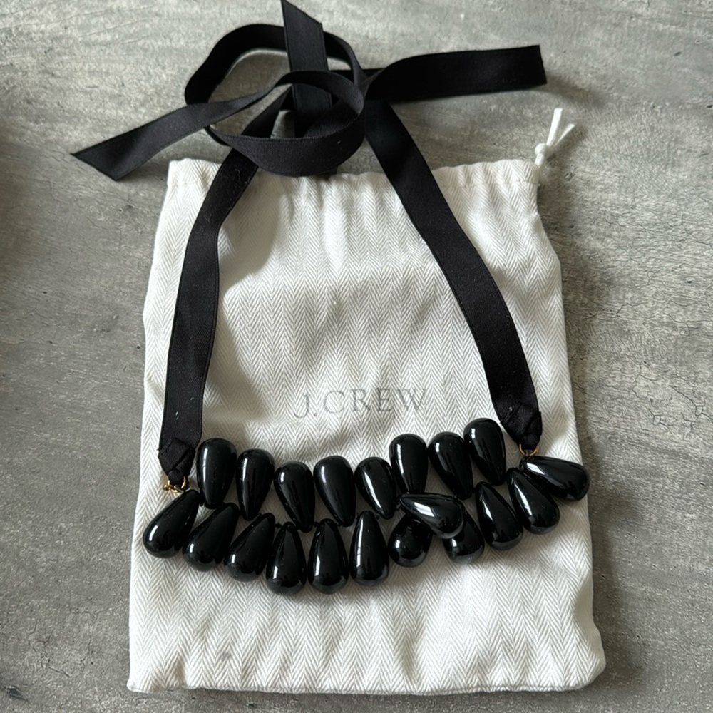 J Crew costume jewelry. Black necklace on black ribbon. Never worn.